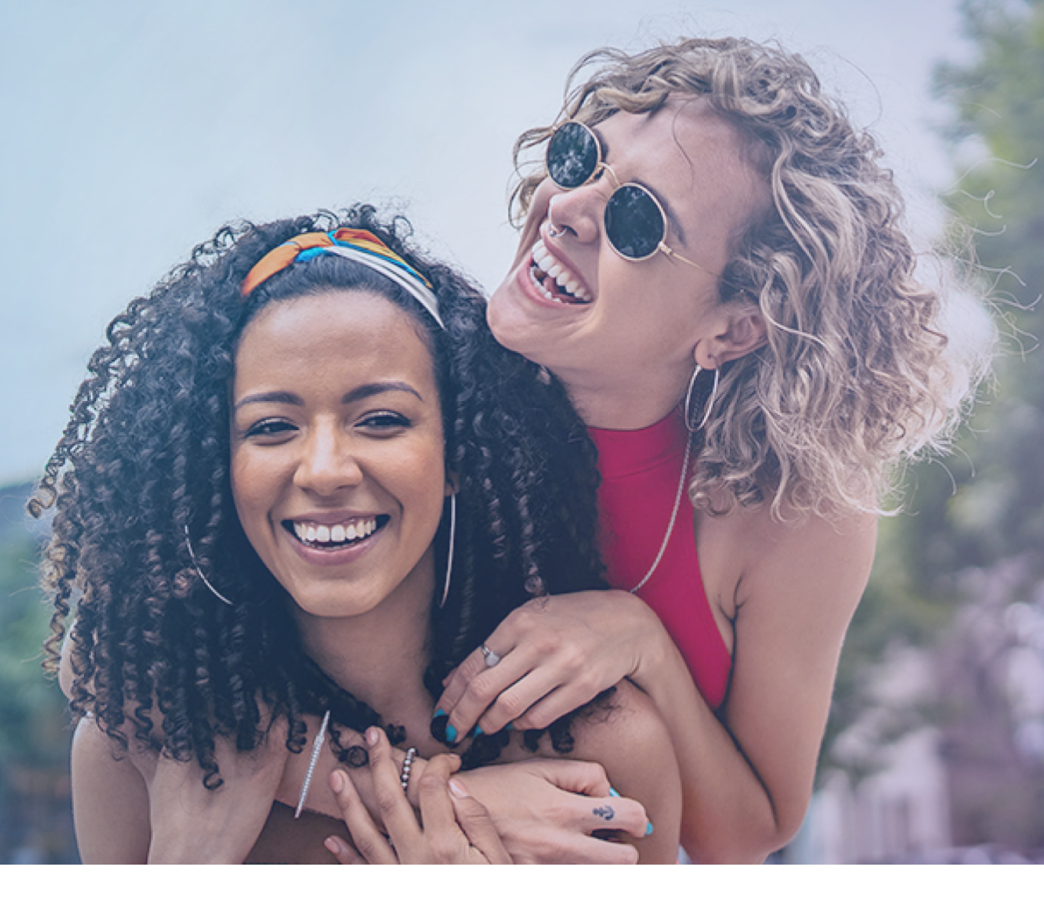 blonde and brunette women enjoying their day in the sun