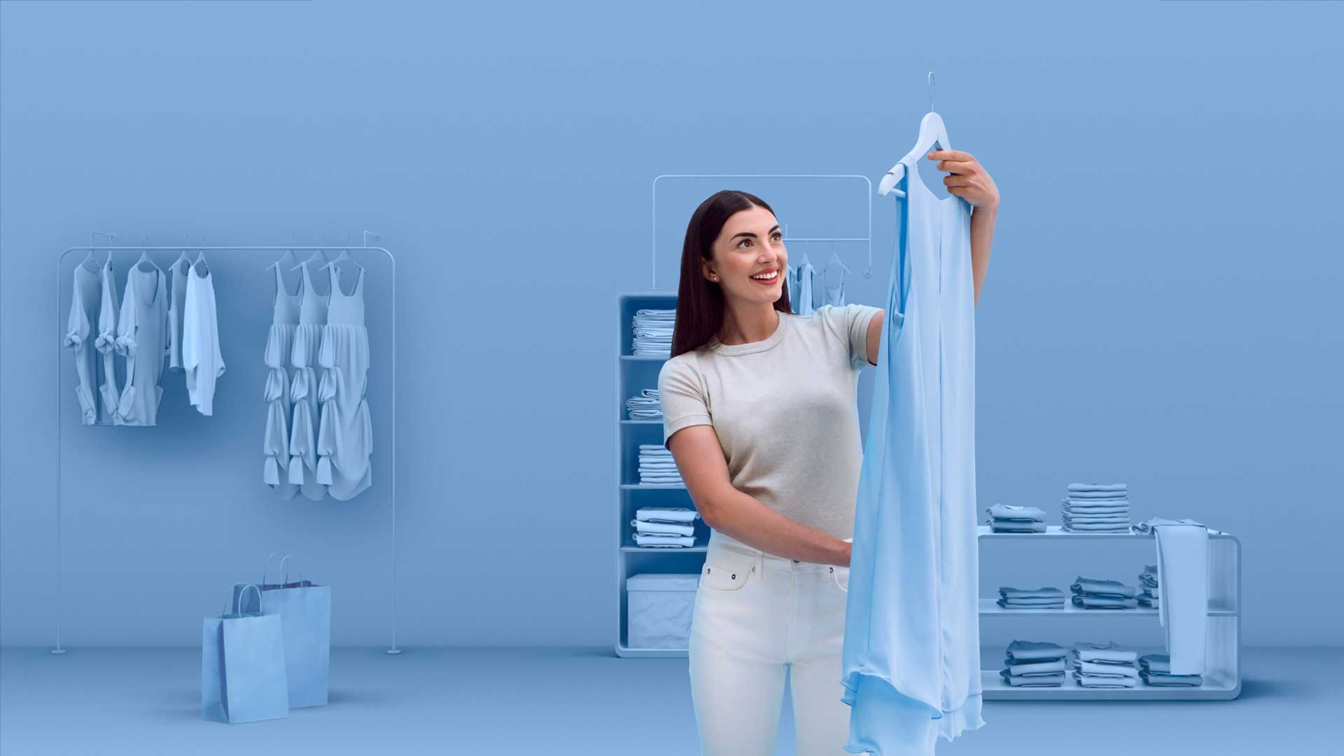 A woman in a powder blue room looking at a powder blue dress.