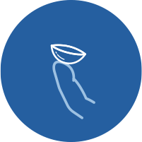 Contact lens balanced on finger tip